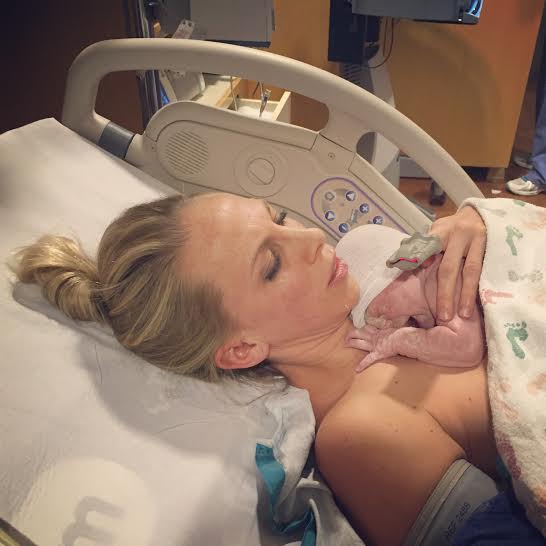Relieved to have my baby in my arms and have the pain stop. 